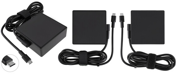 Compact laptop charging adapter on white background.