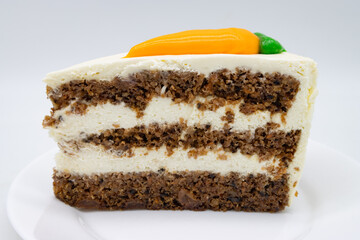 Slice of Delicious Carrot Cake with Layers on a White Plate