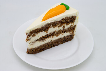 Slice of Delicious Carrot Cake with Layers on a White Plate