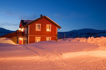 illuminated house in the evening