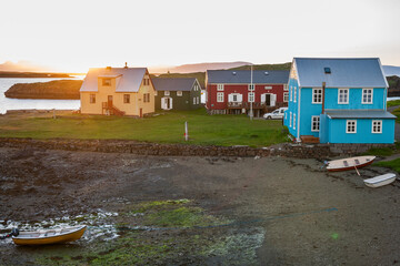 Obraz premium Little houses on Flatey island in Iceland at midnight