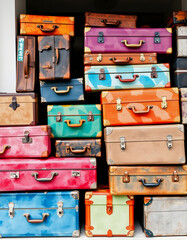 Watercolor Pile of old vintage suitcases, colorful, with white tones