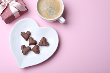 Romantic breakfast on pink background, flat lay with space for text. Valentine's day celebration