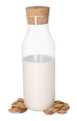 Glass and bottle of almond milk and nuts isolated on white