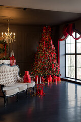 An Elegant Holiday Living Room featuring a beautiful Christmas Tree and vibrant Red Decor