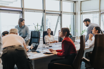 A group of multicultural business people engaged in a meeting within a modern office setting, brainstorming and discussing solutions. They represent diverse ages and backgrounds.