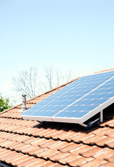 Renewable energy system with solar panel on the roof, vintage, with white tones