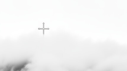 A calming atmosphere surrounds a mist-covered cross against a hazy backdrop