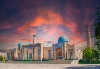 Colorful sunset illuminating hazrat imam mosque and madrasah in tashkent, uzbekistan, a beautiful...