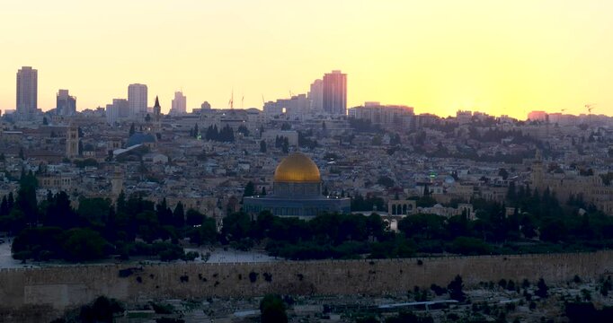 Golden-Roofed Mosque in the Middle of the City at Sunset, in Jerusalem