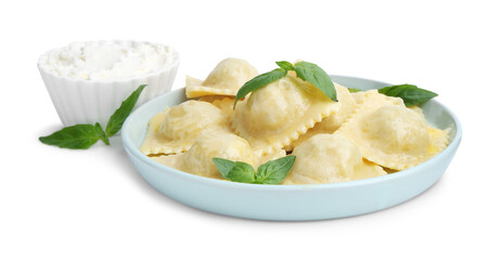 Delicious ravioli with cheese and basil isolated on white