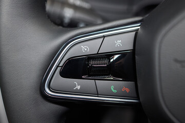 The modern cars steering wheel control panel boosts convenience and performance