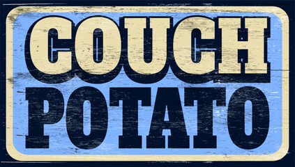 Aged vintage couch potato sign on wood