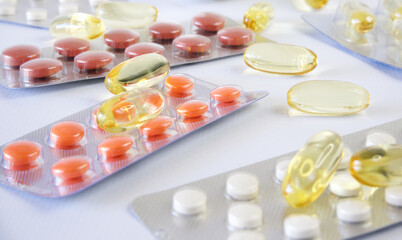 Medicines and vitamins on a white background