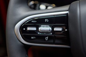 Obraz premium The modern cars steering wheel control panel boosts convenience and performance