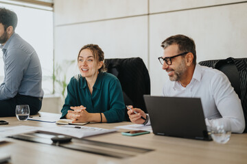 A group of diverse people engaged in a lively business meeting, sharing ideas and working together. The atmosphere is collaborative and focused within a modern office setting.