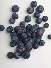 Heap of blueberries on white background