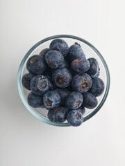 Heap of blueberries on white background