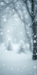 Soft, blurred winter scene with delicate snowflakes and drifting snow, grey, blur