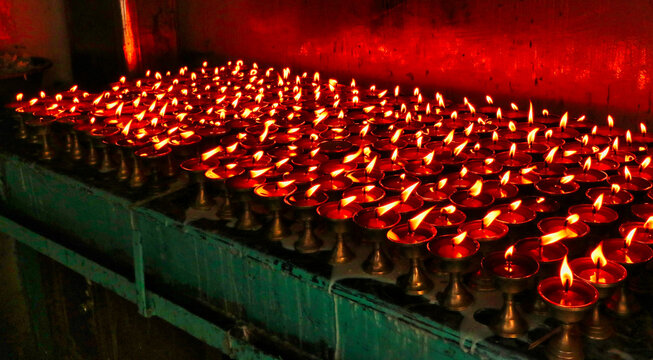 Votive lamps as offerings to the Buddha at the Dhammakirti Shree Gha Vihara,center for Newari Buddhism in Old Kathmandu,Nepal 