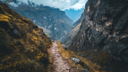 Narrow Trail Overlooking Deep Mountain Valley