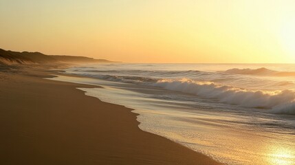 Obraz premium Serene Sunset Over Calm Ocean Waves on Tranquil Beach Shoreline