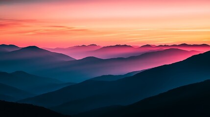 Fototapeta premium A wide view of the mountain ranges during the golden hour, with the sunset sky blending into vibrant colors while the mountains are softly illuminated in warm, golden light 