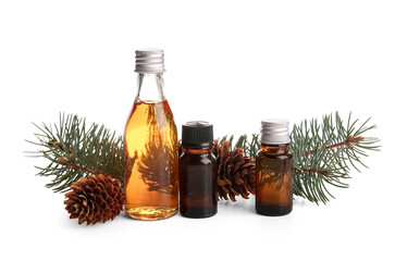 Bottles of essential oil with pine cones and fir branch on white background