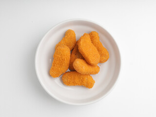 Chicken nugget in white bowl