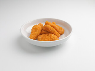 Chicken nugget in white bowl