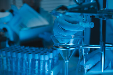 lab, team of medical research scientists work on a new generation disease cure, they use scientific equipment, test tubes, data implementing technology, laboratory looks busy,