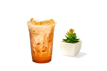 Ice Thai tea serving on white background in isolated concept.