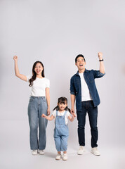 Fototapeta premium full body of a happy asian family posing on a white background
