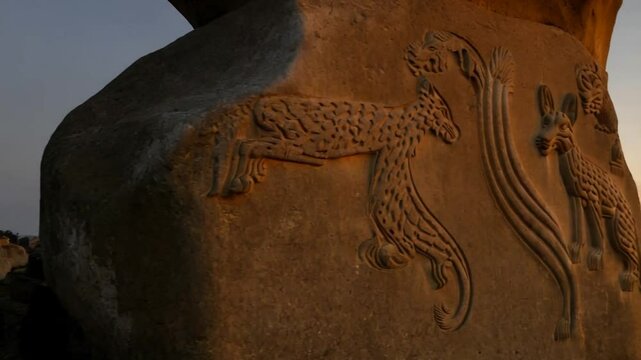 Intricate Animal Carvings on G&ouml;bekli Tepe Pillars, Mystical Twilight at Ancient Sanctuary in Turkey, 9000 BCE Golden Glow Archaeological Footage"