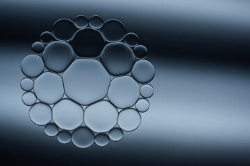 Abstract blue circular bubble pattern with gradient background