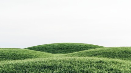 Naklejka premium A serene landscape featuring rolling green hills under a pale sky, evoking tranquility and the beauty of nature.