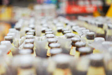 Bottles of beverages in a supermarket display