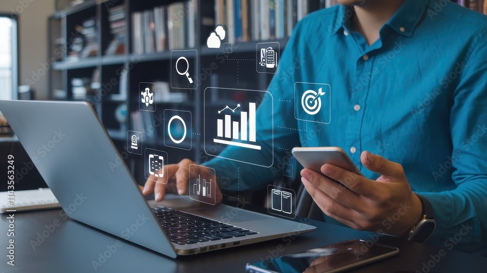 Poster man using laptop and phone displaying business analytics data