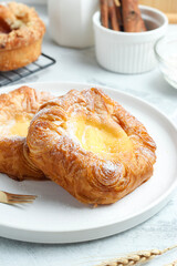 Danish pastry with icing sugar.