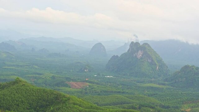 Beauty in nature of mountain with cloudy sky and greenery in rainy season at Doi Tapang, Sawi District, Chumphon, Thailand.
