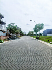 Jakarta, Indonesia - December 11, 2024: Empty footpath with sidewalks on both sides.