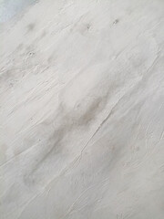 Obraz premium Gray paint texture applied with a brush on the surface, creating an artistic brush effect.