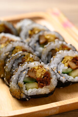 Gimbap or kimbap, Korean food made from cooked rice with vegetables, meat, egg and wrapped with dried seaweed