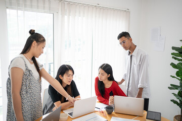 Business people group diverse colleagues team discuss project in  bright modern office Startup Diversity Teamwork Brainstorming.
