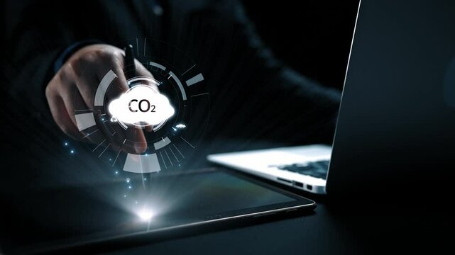 Business person implements initiatives to reduce CO2 emissions, aiming for net zero. Showcases commitment to sustainability by reducing CO2 for a greener planet. UUID