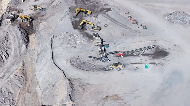 Aerial Payson Utah heavy equipment construction circle. Central Utah city. New home construction, heavy industrial earth moving equipment. Urban and rural landscape in mountain valley. 
