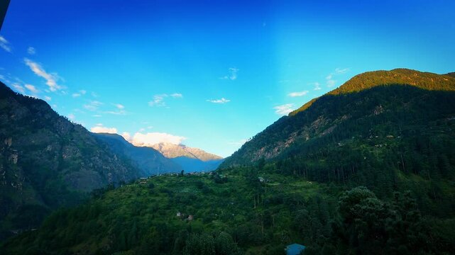 Beautiful timelapse of the sunset on the mountains of parvati valley in Himachal Pradesh, India	