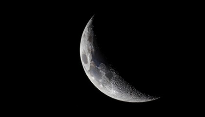 Naklejka premium Detailed Crescent Moon in the night sky. Crescent Moon on black background with space