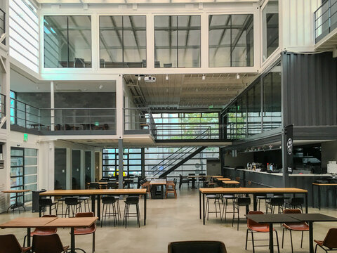 Buildings constructed by combining modular shipping containers, repurposed into cultural spaces, storage, and creative architecture.