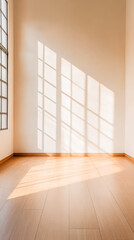 Obraz premium Natural sunlight creates beautiful patterns in a serene indoor space with wooden flooring